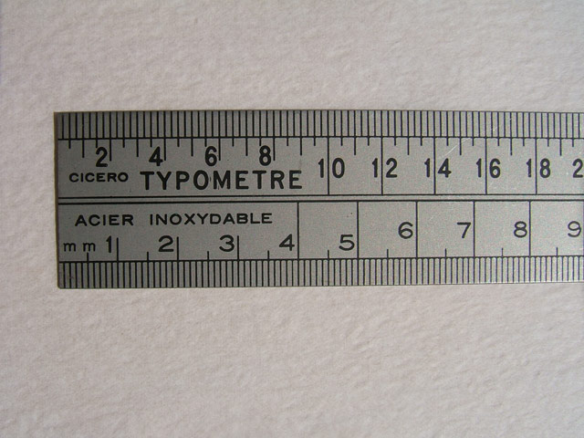 Typomètre en acier